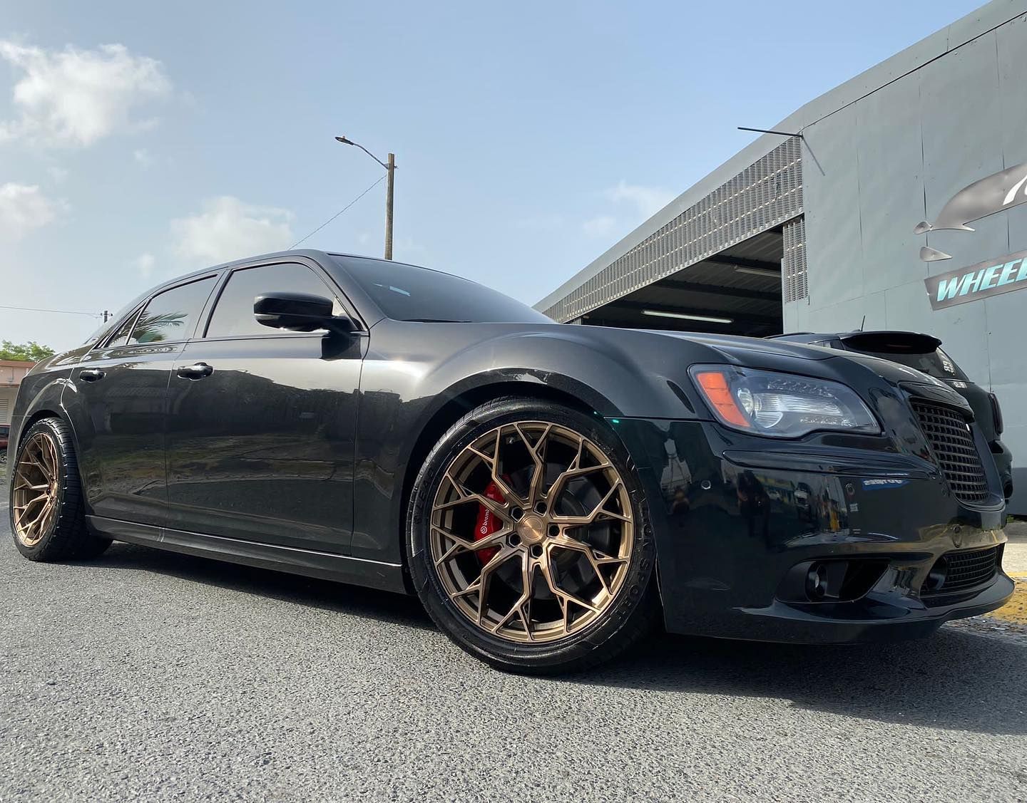 Chrysler 300C with 20×9 and 20×11-inch Stance SF10
