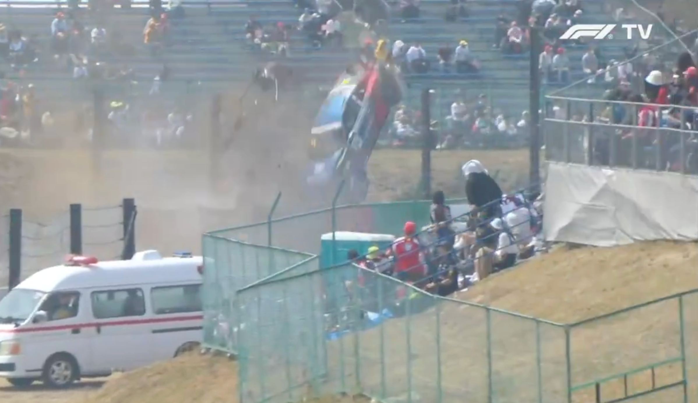 Porsche Barrel-Rolls Over Fence, Delays F1 at Suzuka