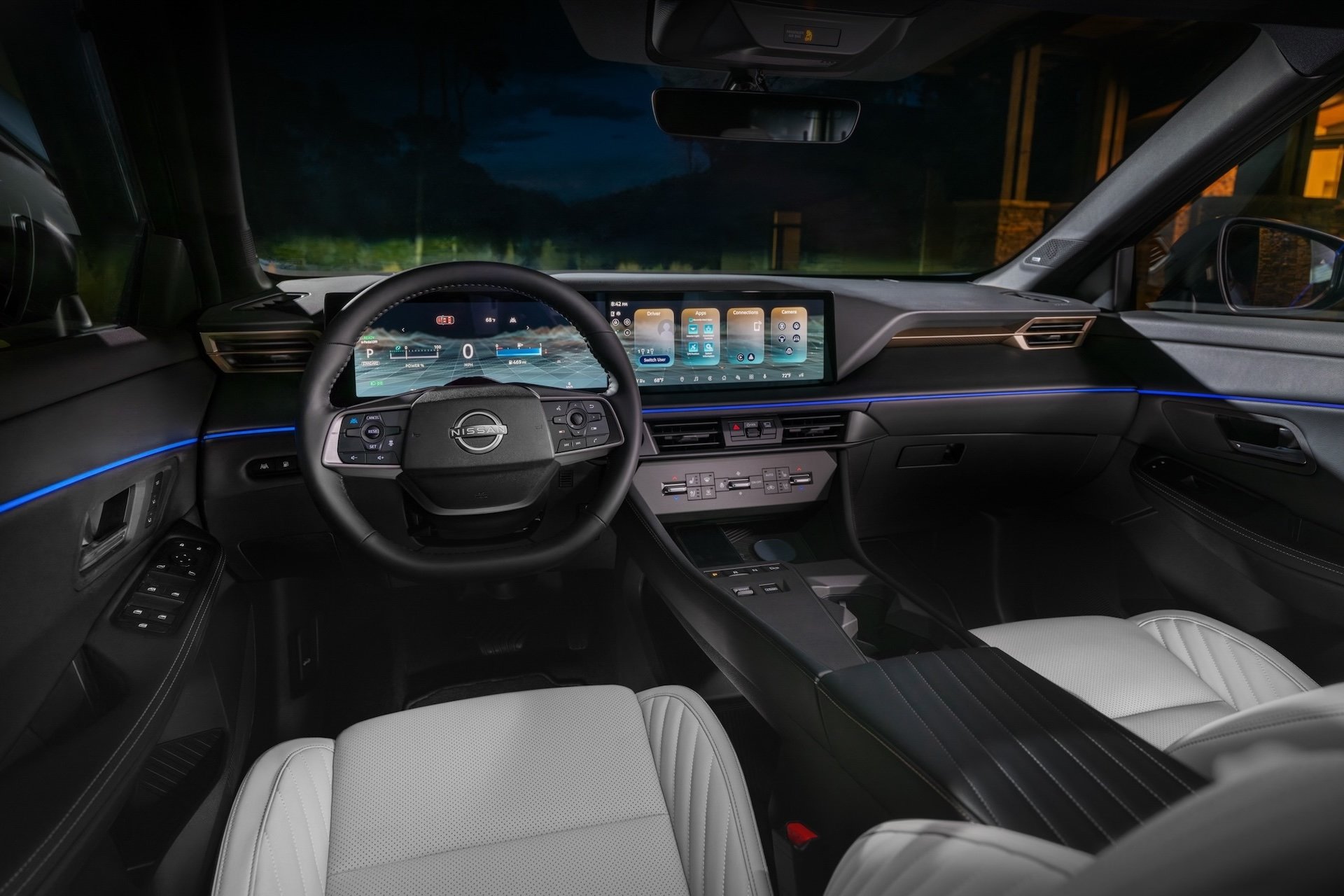 The steering wheel, dashboard and windhsield as viewed from the 2027 Nissan Rogue Hybrid Platinum