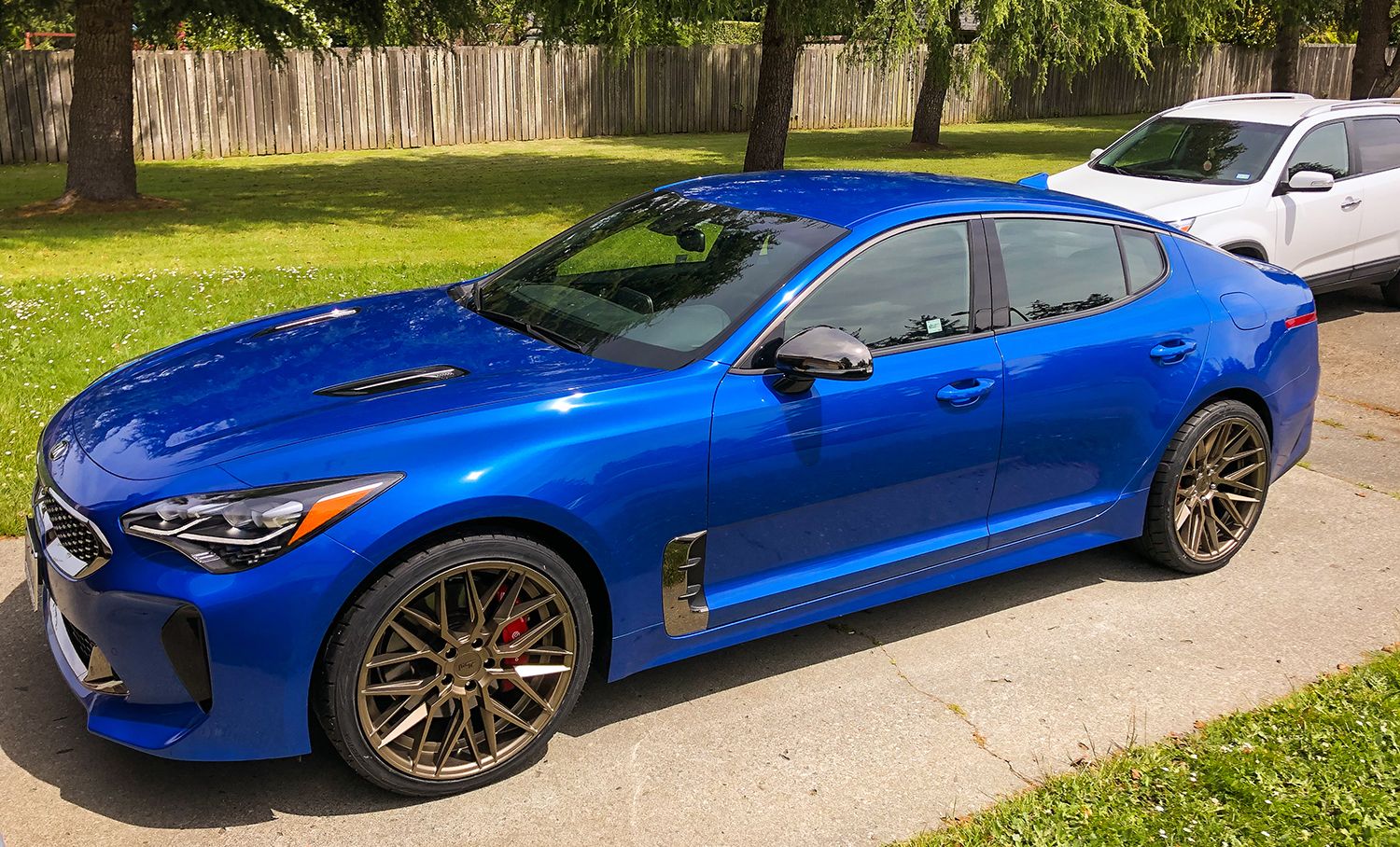 Wheel Front | Gallery - Blue Kia Stinger with bronze 20x9.5 and 20x10.5 Nic...