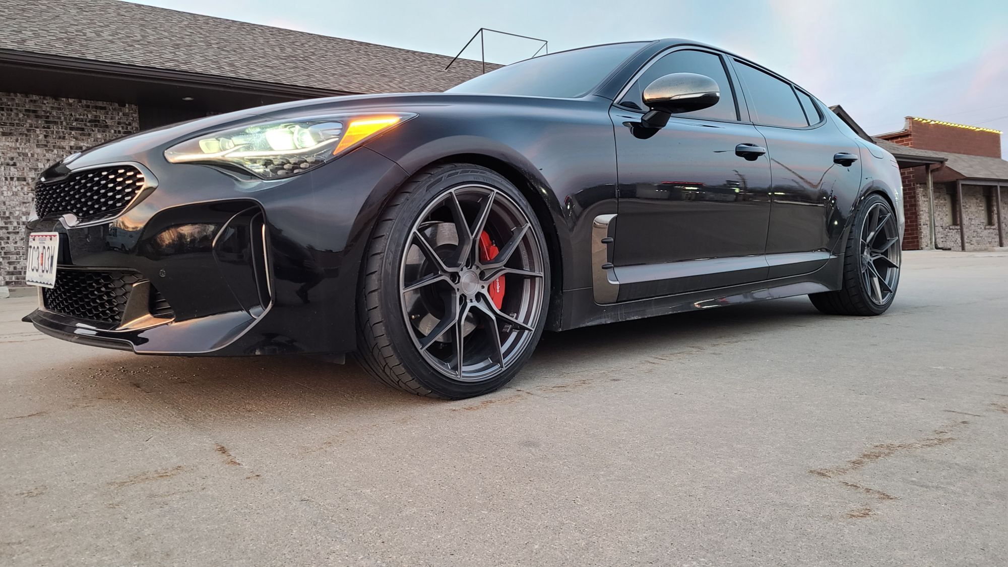 Kia Stinger with 20 × 9 and 20 × 10.5-inch Stance SF07 Aftermarket Wheels.